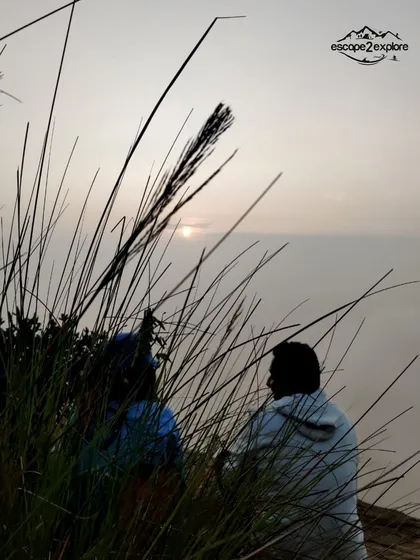 A quiet moment watching the sunrise from Uttari Betta.