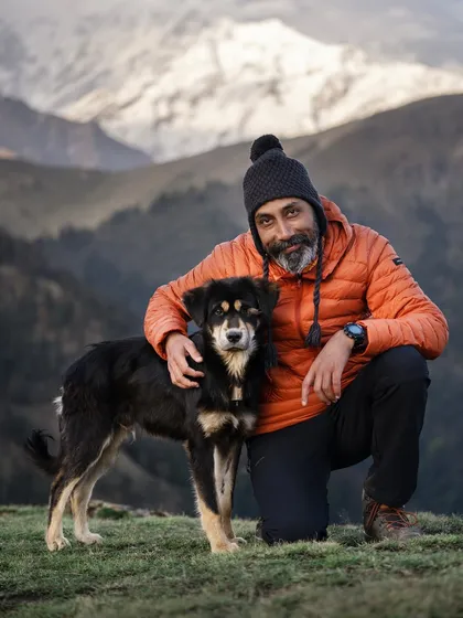 This is me in my element, with a furry friend against the backdrop of the Himalayas. My passion for animals and adventure is the driving force behind every photograph I take.