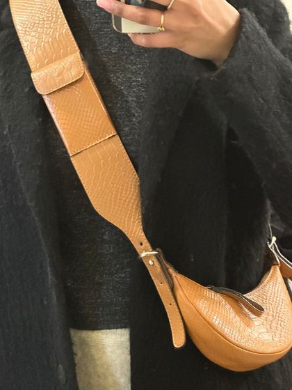 A close-up of the Selena Tan Croc's wide, comfortable strap. The croc-embossed texture adds a touch of luxury to this practical and stylish shoulder bag.