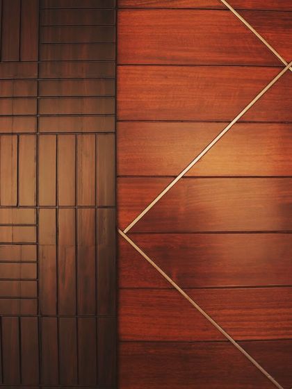 A detail shot from the Overseas Traders office, showing different patterns of wood paneling. This highlights the creative use of leftover materials.
