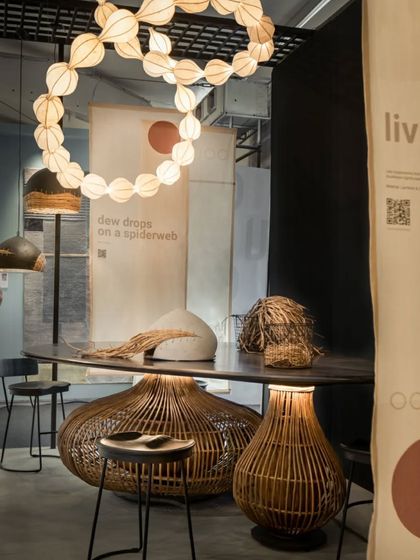 We believe in showing the craft behind the product. For this exhibition, we created a central community table with a beautiful lantana base where a craftsman could work live. This allowed visitors to see the skill involved and have conversations, deepening their understanding of the brand's handmade ethos.