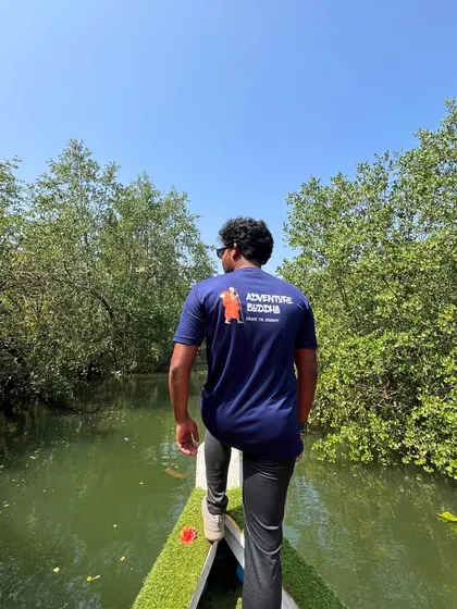 An Adventure Buddha team member exploring the mangrove backwaters of Honnavara. We lead the way to the best spots.