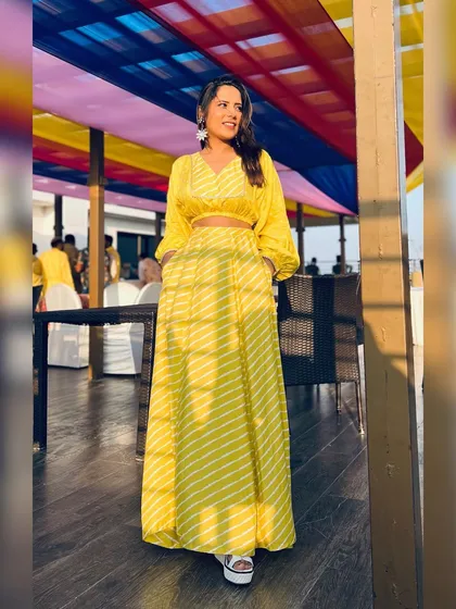 Another look at my yellow co-ord set. The platform sandals and statement earrings completed this casual-chic look.