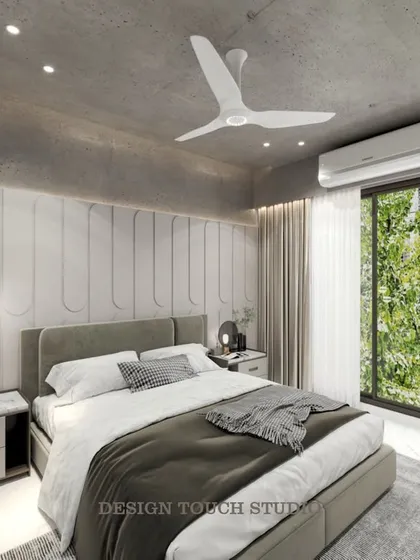 This angle highlights the natural light from the large window and the simple, elegant curtain design.