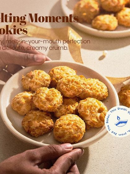 My Melting Moments Cookies, buttery and delicate with a creamy crumb, arranged on a plate. They are a perfect addition to a festive hamper.