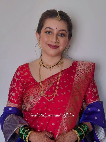 A happy bride ready for her big day. The makeup is natural yet defined, ensuring she looks and feels her absolute best.