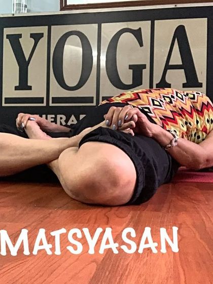 A variation of Fish Pose in full lotus, which adds a deep hip-opening element to the backbend.