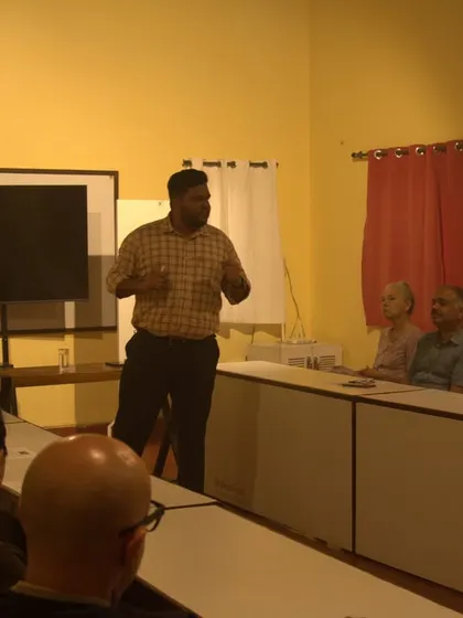 A wider view of our Ayurveda talk, showing the interactive and engaging nature of the session. Guests are encouraged to ask questions and deepen their understanding of this ancient science.