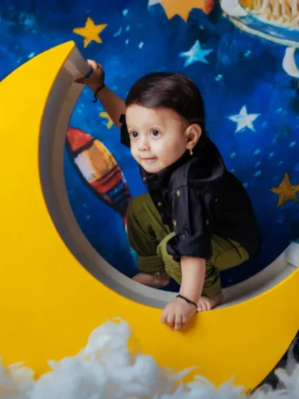 A moon with a heart full of stars. This cosmic backdrop is perfect for your little dreamer.