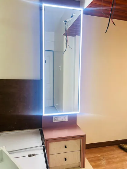 Another view of the backlit vanity mirror, showing its sleek and modern design.