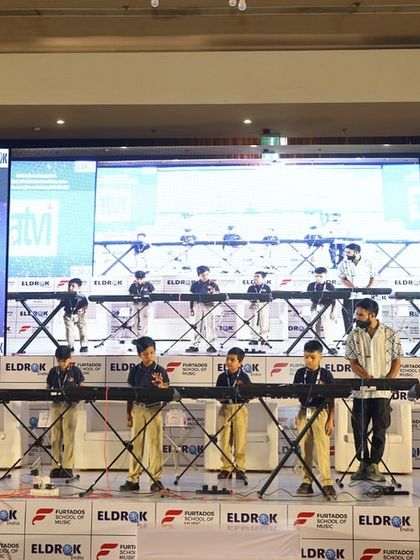 Our student keyboard ensemble performing live at the Eldrok India K-12 Summit in Indore. This is a perfect example of how I provide students with high-profile platforms to showcase their skills.