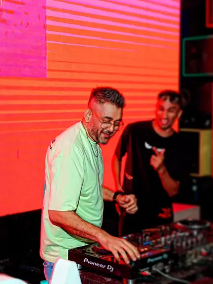 Sharing a laugh behind the decks at Bombay Adda. I always have a great time performing, and that positive energy is contagious.