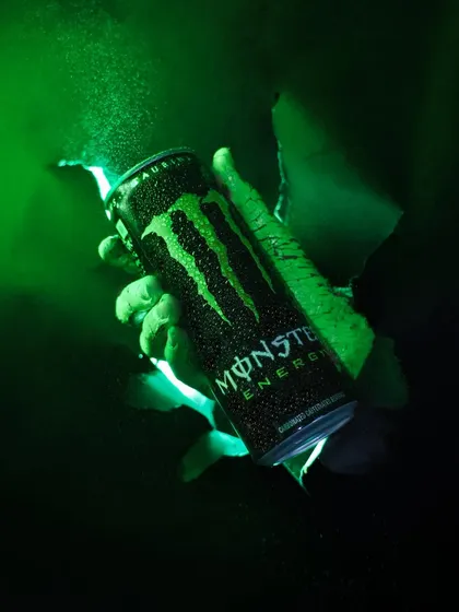 Another angle of the Monster energy drink shoot. This shot captures the spray and condensation on the can, adding to the intense and energetic feel.