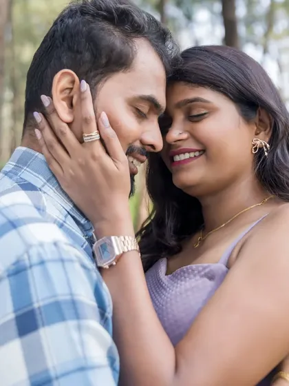 A sweet, intimate moment during a pre-wedding shoot in a serene forest setting. We guide our couples into poses that feel natural and bring out their genuine emotions.