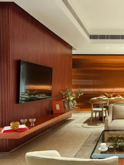 A tranquil retreat from city life. This show apartment for Elevate in Gurugram was crafted to redefine residential experiences. The design balances contemporary aesthetics with biophilic principles, using warm wood tones and a seamless flow to create a space that nurtures wellbeing.
