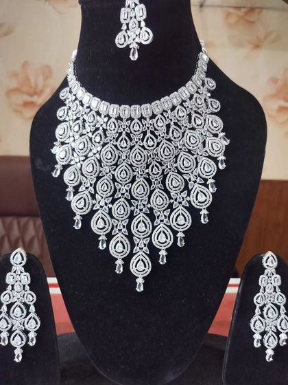 A grand, cascading American Diamond necklace set designed to make a statement at any reception or gala.