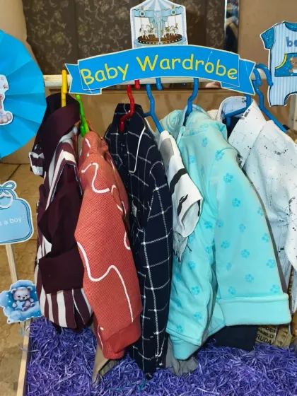 This is the matching 'Baby Wardrobe' for the twin boy, filled with a variety of stylish and comfortable outfits for the little one.