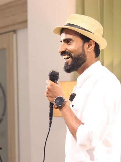 A happy performer enjoying his time in the spotlight.