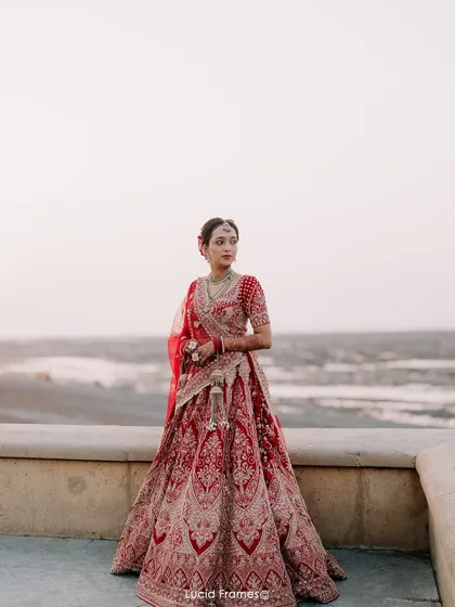 A bride standing against an endless horizon. This is more than a portrait; it’s an artistic statement, showcasing the bride's strength and grace in a breathtaking destination setting.