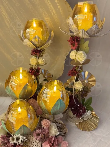 These golden lotus candle stands are one of my favorite pieces for Diwali decor. They add height and a warm, ambient glow to any festive arrangement, blending traditional motifs with a modern feel.