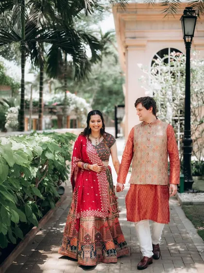 Another lovely shot of Shubhi and Devan walking and talking together. My approach is to let couples interact naturally, allowing me to capture their genuine connection.