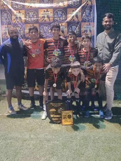 The U15 champions. These players also competed in a higher age category, proving their skill and determination.