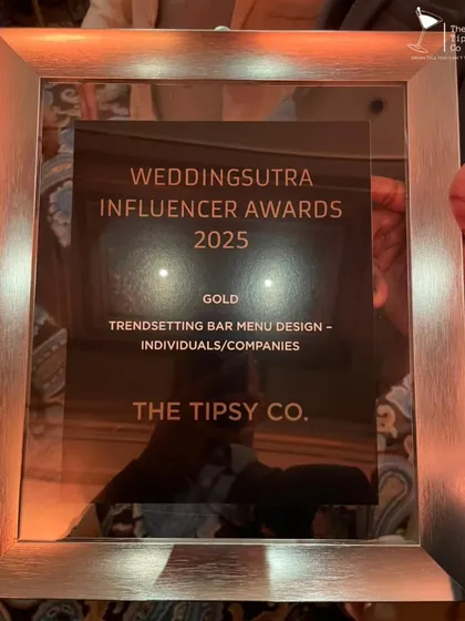 A close-up of our framed Gold award from the WeddingSutra Influencer Awards 2025. This is a symbol of our team's hard work and creative vision.