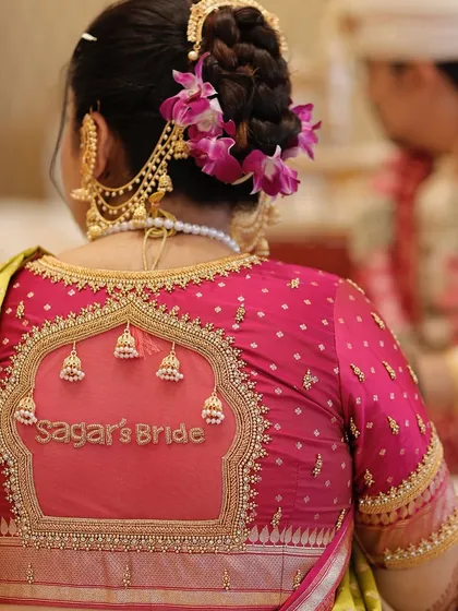 Details matter. This shot shows the personalized blouse and the traditional floral khopa, elements I help coordinate to create a complete and unique bridal look.