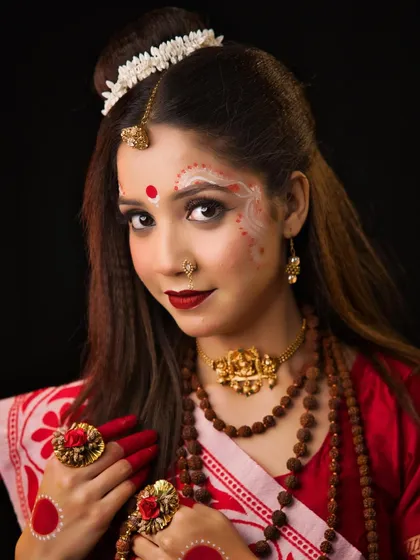 A close-up of the Maa Brahmacharini look, highlighting the Rudraksha beads and the simple, ascetic styling.