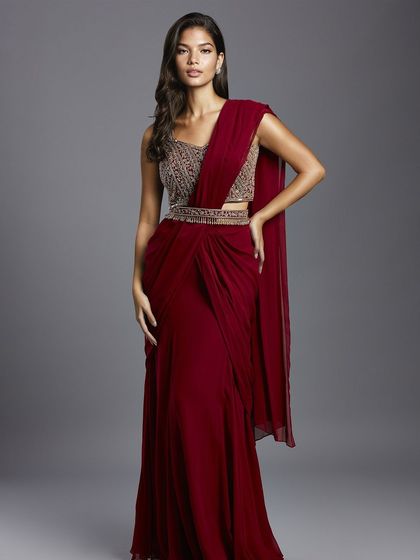 This cluster is a tribute to the saree in all its forms. It includes traditional weaves, modern pre-draped styles, and sarees paired with unique blouses, showcasing the endless possibilities for styling this iconic Indian garment.