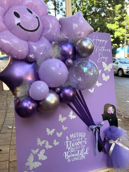 Another angle of the "Regal Purple Greetings" postcard, showing the depth and dimension of the balloon arrangement against the beautifully designed card.