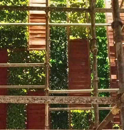 This photo was taken during the installation of a large facade, showing the scaffolding required for such projects. I handle everything for large-scale commercial and residential installations, ensuring a safe and professional process from start to finish.