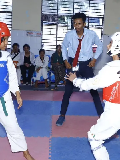 The intensity of a real match. Two of our young female athletes face off in a sparring competition, showcasing the skills, focus, and courage we instill in our training.
