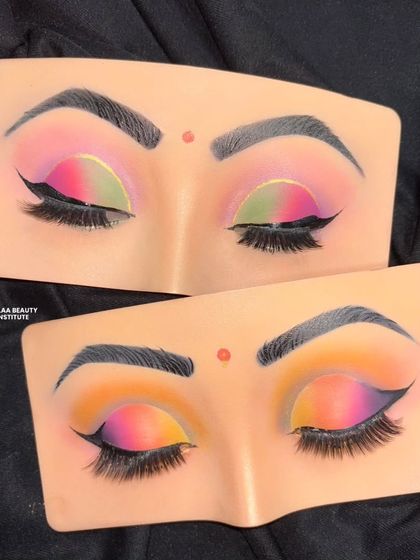 These eyes are saying it all. This practice board shows a vibrant sunset-inspired eyeshadow look, demonstrating our students' skills in color blending.