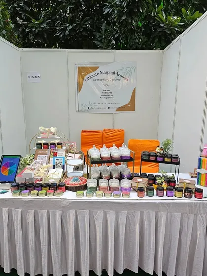 A full view of my stall setup on Day 2. It's so rewarding to see all my products displayed, from the mini tins to the large crystal jars and festive Ladoo candles.