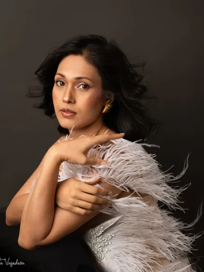 Another stunning portrait from the giveaway session. The composition and her pose create a high-fashion, magazine-worthy image that is both elegant and powerful.