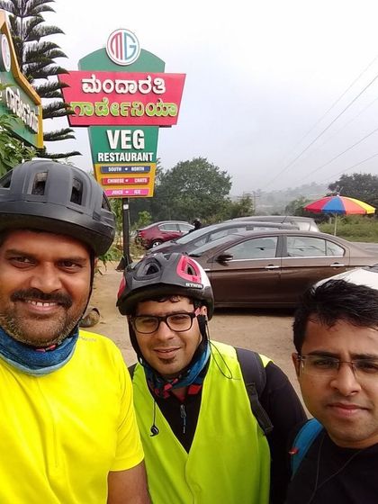 Post-ride celebration after completing the Bangalore-Mysore route. A mandatory stop at a local veg restaurant to refuel.