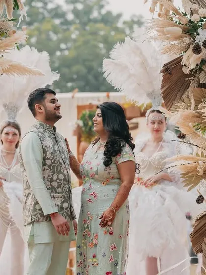 A beautiful moment of connection between the couple at their 'Farmer's Market' themed event.