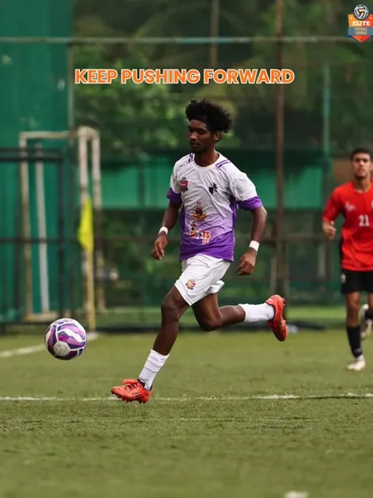 "Keep Pushing Forward." An action shot of a player on the attack, embodying our philosophy of always moving towards the goal.