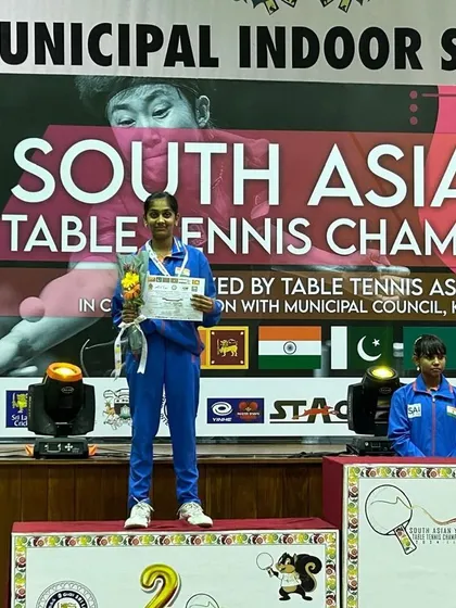 Divyanshi on the podium after winning gold in team events and silver in singles at the South Asian Table Tennis Championship in Sri Lanka.