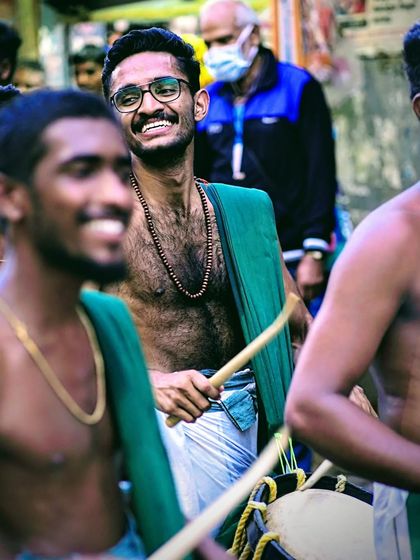 A candid shot capturing the happiness of being lost in the rhythm. This is the feeling we share with our audience at every performance.