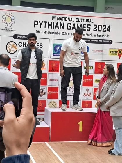 A candid shot of our fighters on the podium. These moments of victory are what we strive for.