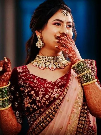A candid moment of laughter and joy. This bride's henna-adorned hand looks so elegant as she smiles. This is why I love what I do.