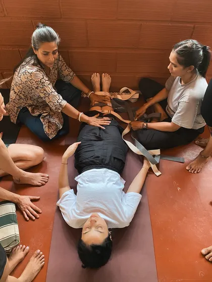 This hands-on session focuses on therapeutic adjustments for the lower back and hips. Students learn how to use straps to create stability and space, a key skill for any yoga therapy teacher.