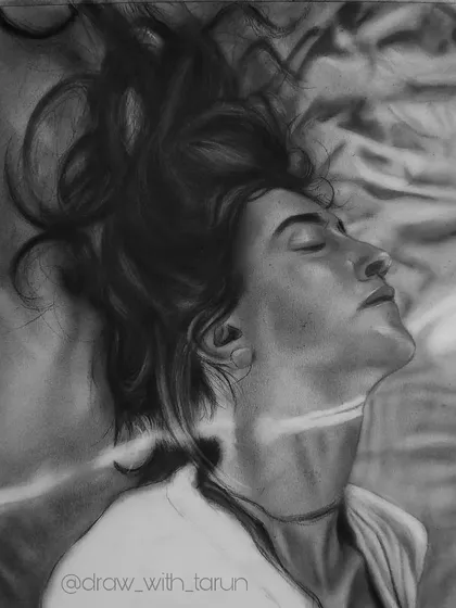 A charcoal piece in progress. The soft, blended background and the dramatic lighting across the neck and face create a very atmospheric and emotional mood.