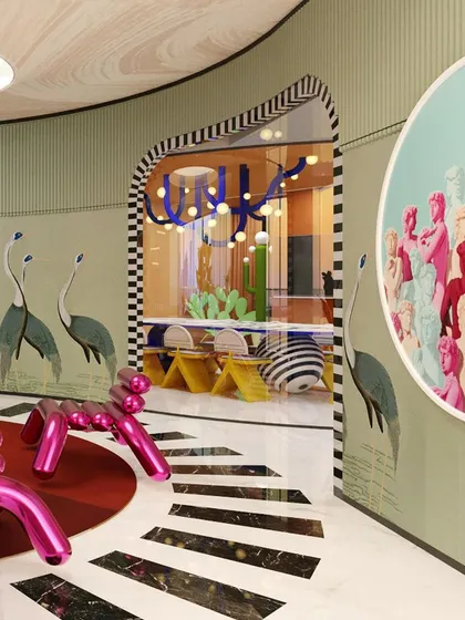 The walls are adorned with whimsical murals, like these stylized birds, which add to the room's storybook feel.