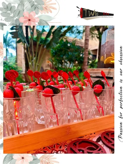 Close-up of our bespoke cocktail picks, designed to match the event's theme and add a special touch to each glass.