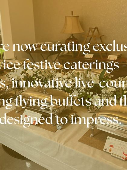 A full-service festive catering setup. This image shows a classic buffet line with silver chafing dishes, ready to serve a menu of fusion snacks and innovative dishes designed to impress.