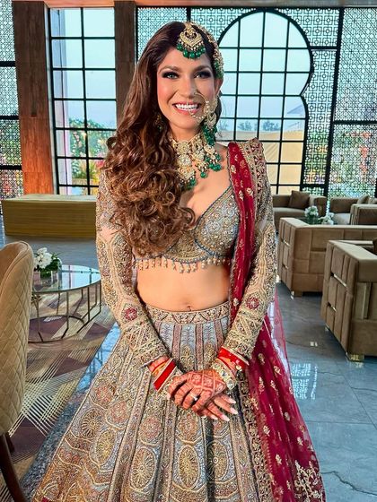 A radiant, smiling portrait that perfectly captures the happiness of a bride on her wedding day.