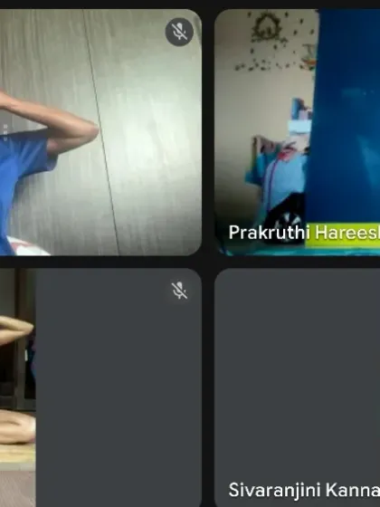 Students practice Bhramari Pranayama during an online class. Even from a distance, we can connect through the power of breath and shared intention.